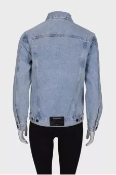 Blue denim jacket with tag