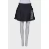 Denim skirt with beaded embroidery