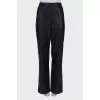 Black eco-leather trousers