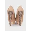 Leather shoes decorated with rhinestones