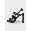 Leather sandals with tag
