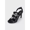 Leather sandals with tag