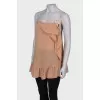 Silk top with brooch