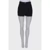 Black shorts with tucks