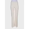 White silk trousers