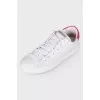 White embossed sneakers