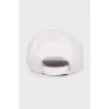 Textile cap with brand logo