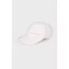 Textile cap with brand logo