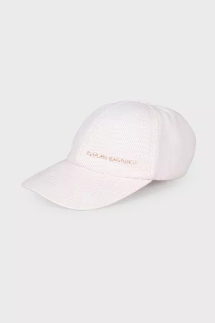 Textile cap with brand logo