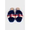 Textile mules decorated with a bow