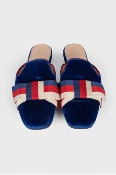 Textile mules decorated with a bow