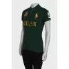 Green polo shirt with tag