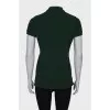 Green polo shirt with tag