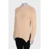 Beige long sweater, with a tag