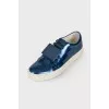 Blue sneakers with metallic decor