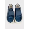 Blue sneakers with metallic decor