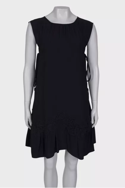Navy blue dress with lace at the hem