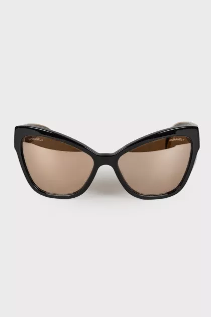 Gold and black sunglasses  