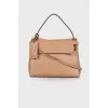Beige bag with gold hardware