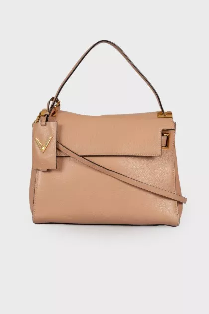 Beige bag with gold hardware