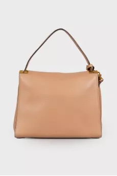 Beige bag with gold hardware
