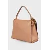 Beige bag with gold hardware