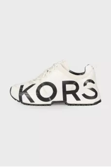 White sneakers with brand logo