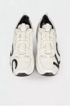 White sneakers with brand logo