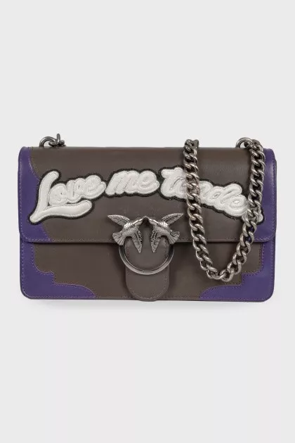 Leather bag with patch