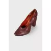 Maroon leather pumps