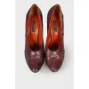 Maroon leather pumps