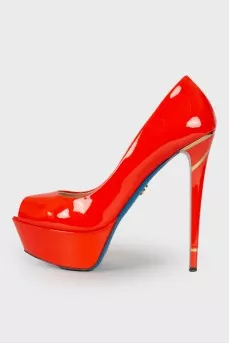 Orange patent leather shoes