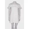 Mini dress with openwork sleeves