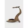 Leather pumps with curly heels