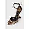 Leather pumps with curly heels