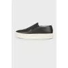 Perforated leather slip-ons