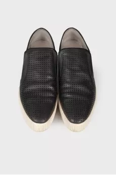 Perforated leather slip-ons