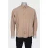 Men's beige shirt with a pocket