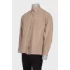 Men's beige shirt with a pocket