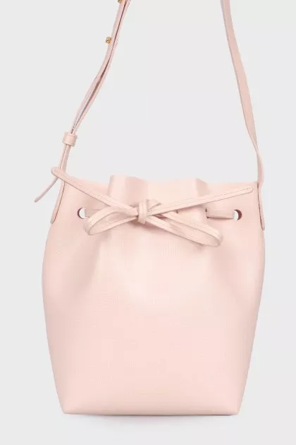 Vertical shoulder bag with tag