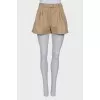 Beige pleated shorts