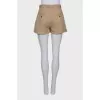 Beige pleated shorts
