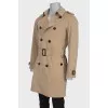 Men's beige trench coat with a belt