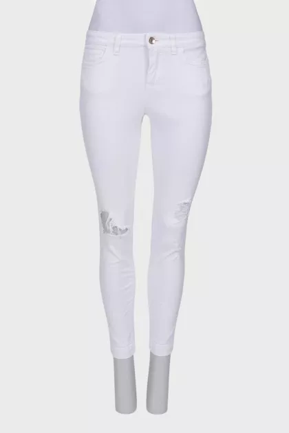 Ripped effect white jeans