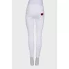 Ripped effect white jeans