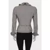 Jacket decorated with silver hardware