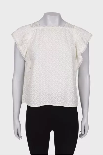 T-shirt with embossed pattern and tag