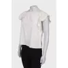 T-shirt with embossed pattern and tag