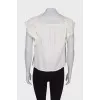 T-shirt with embossed pattern and tag