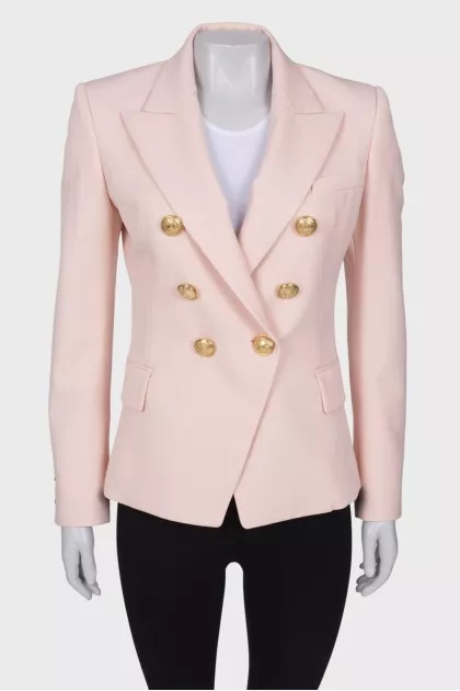 Pink jacket with golden buttons